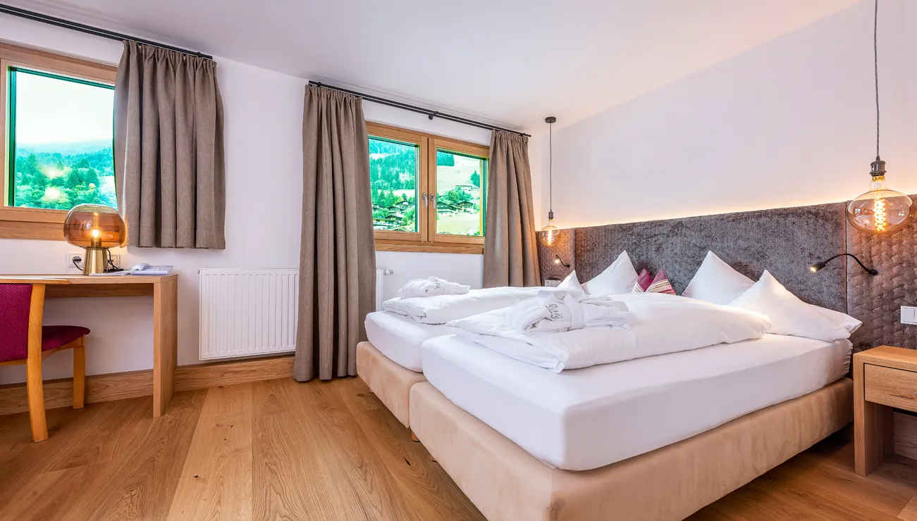 moderne Juniorsuite Bergblick Family im Hotel das Neuhaus
